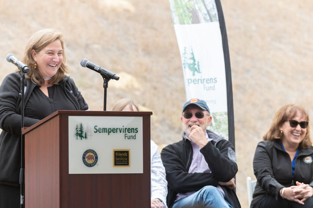Sempervirens Fund Executive Director Sara Barth speaks at the grand opening of the Robert C. Kirkwood Entrance at Castle Rock State Park.